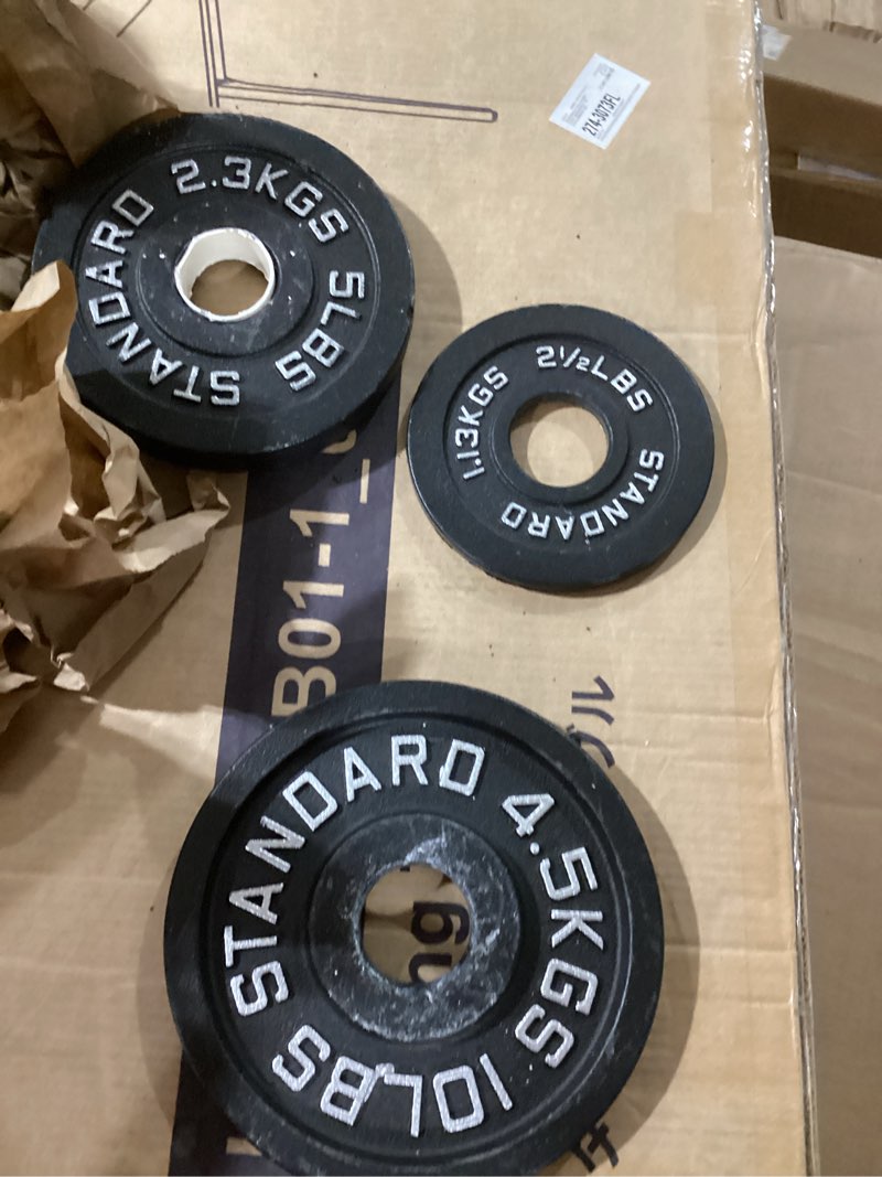 Condition photo showing Good Condition for Cast Iron Plates (1) 10lb (2) 5lb (1) 2.5 lbs
