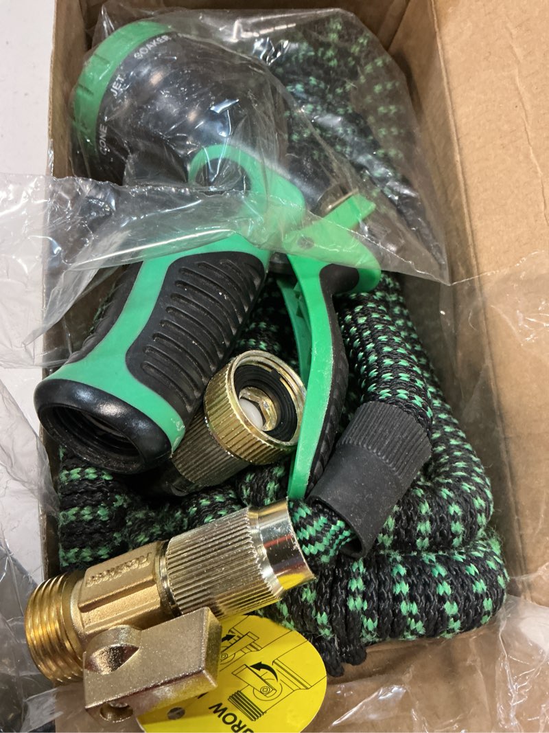 Condition photo showing As Is for flexi hose expandable garden hose with 8 function nozzle, 50ft - lightweight retractable garden hose, water hose - no-kink flexibility, 3/4 inch solid brass fittings and double latex core