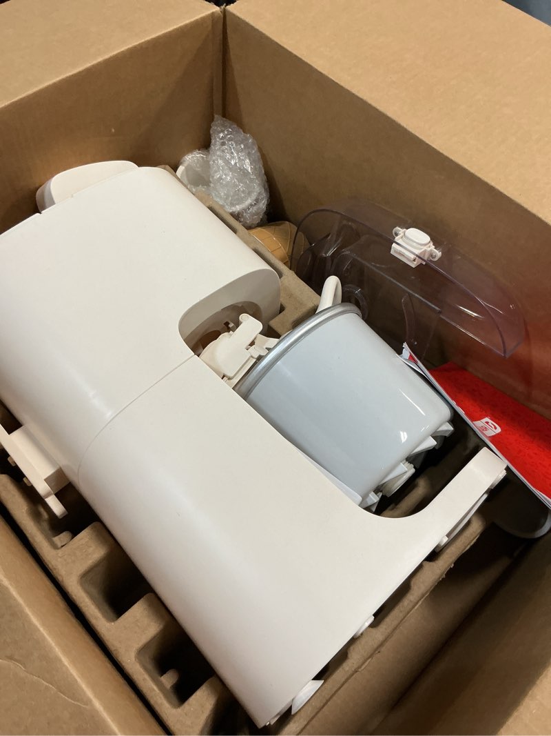 Condition photo showing As Is for dash soft serve ice cream machine - frozen dessert machine for soft serve, froyo, sorbet, and fruit whips - compact design - features double insulated freezer bowl - 1-pint capacity