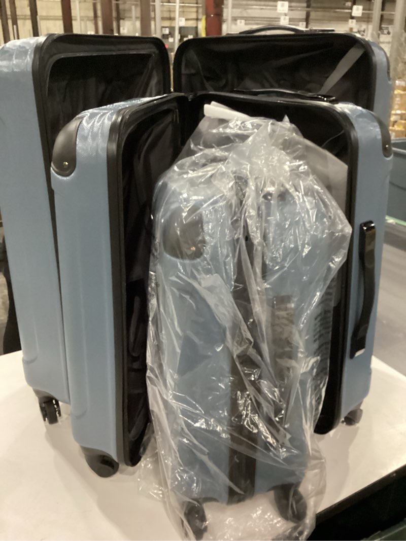 Condition photo showing New/Like New for Kenneth Cole REACTION Out of Bounds Lightweight Hardshell 4-Wheel Spinner Luggage, Granite Blue, 3-Piece Set (20", 24", & 28") 3-Piece Set (20", 24", & 28") Granite Blue