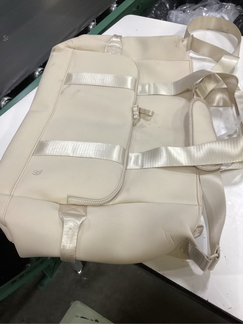 Condition photo showing As Is for faux neoprene weekender bag - all in motion™ cream