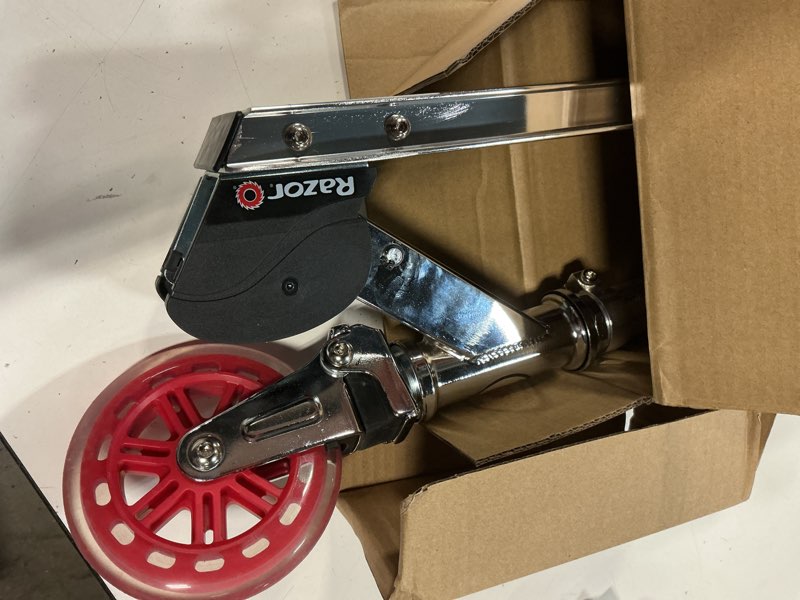 Condition photo showing Good Condition for razor a3 kick scooter for kids ages 5+ - larger wheels, front suspension, wheelie bar, lightweight, foldable, aluminum frame, and adjustable handlebars red