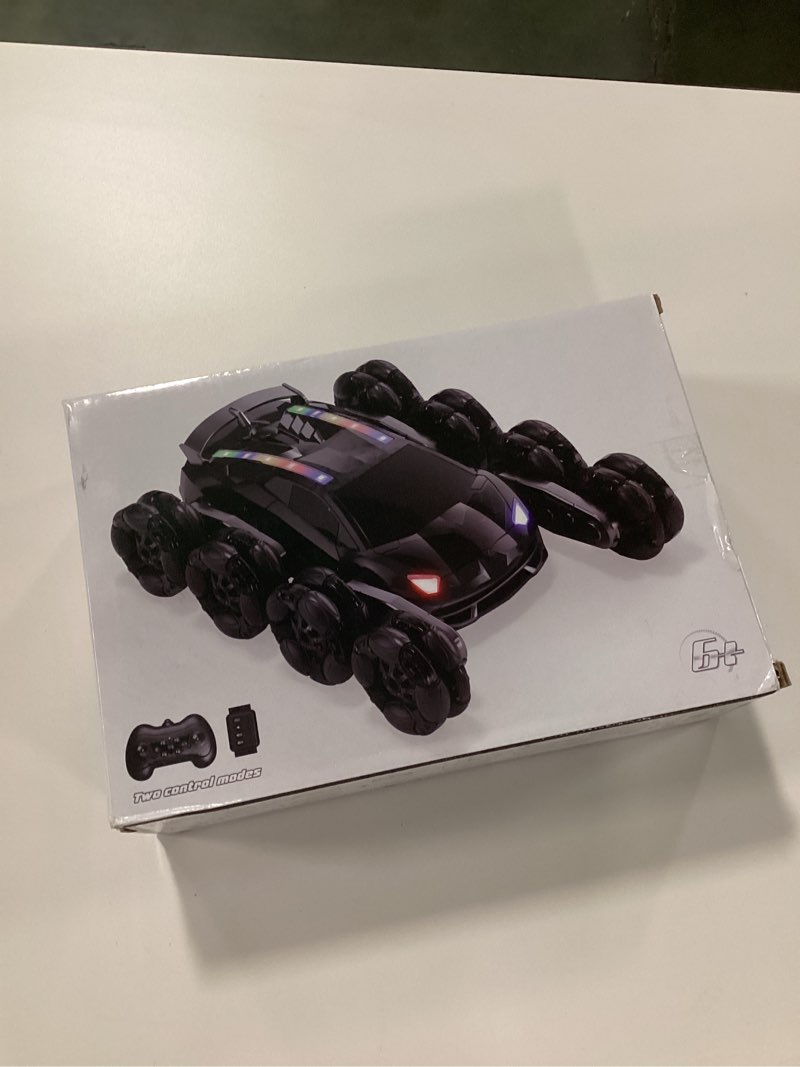 Condition photo showing New/Like New for 8WD Remote Control Car,2.4GHz Gesture Sensing RC Stunt Car,Cool Spray Rotation RC Car with Lights and Music,All Terrain Toys for Ages 5-7 Birthday Gifts for Boys Girls(Black)