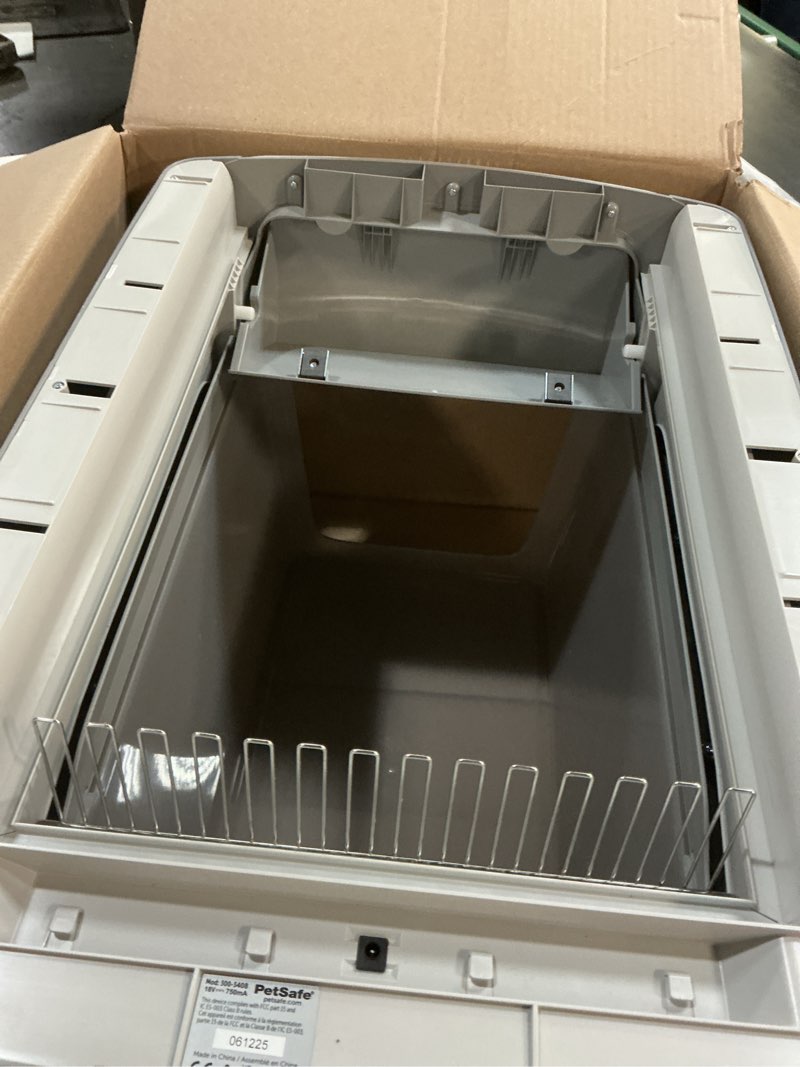 Condition photo showing As Is for PetSafe Legacy ScoopFree Crystal Pro Self-Cleaning Automatic Cat Litter Box - Front-Entry Motion-Sensing Cat Box with Integrated Health Counter - Includes 1 Disposable Crystal Litter Tray Crystal Pro Legacy Litter Box