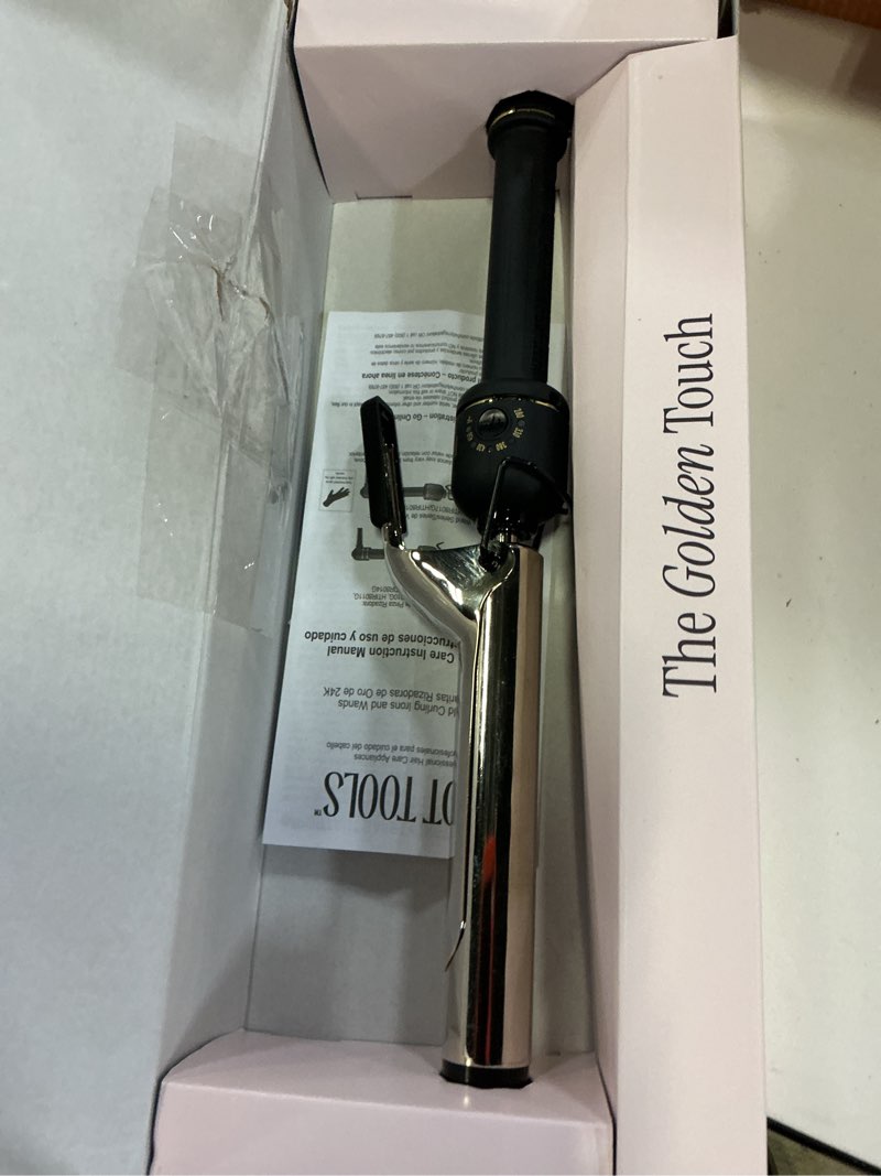 Condition photo showing As Is for hot tools new and improved 24k gold professional 1" extended barrel curling iron with clamp for bouncy curls | 24k gold technology for long-lasting results & longer barrel for easy styling