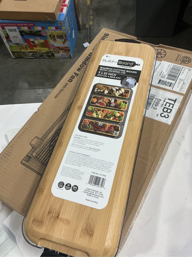 Condition photo showing Good Condition for FARBERWARE Rectangular Build-a-Board Cutting Board with Single Compartment and Clear Locking Lid for Charcuterie, Snacks, and More, Bamboo Black/Bamboo 1 Compartment