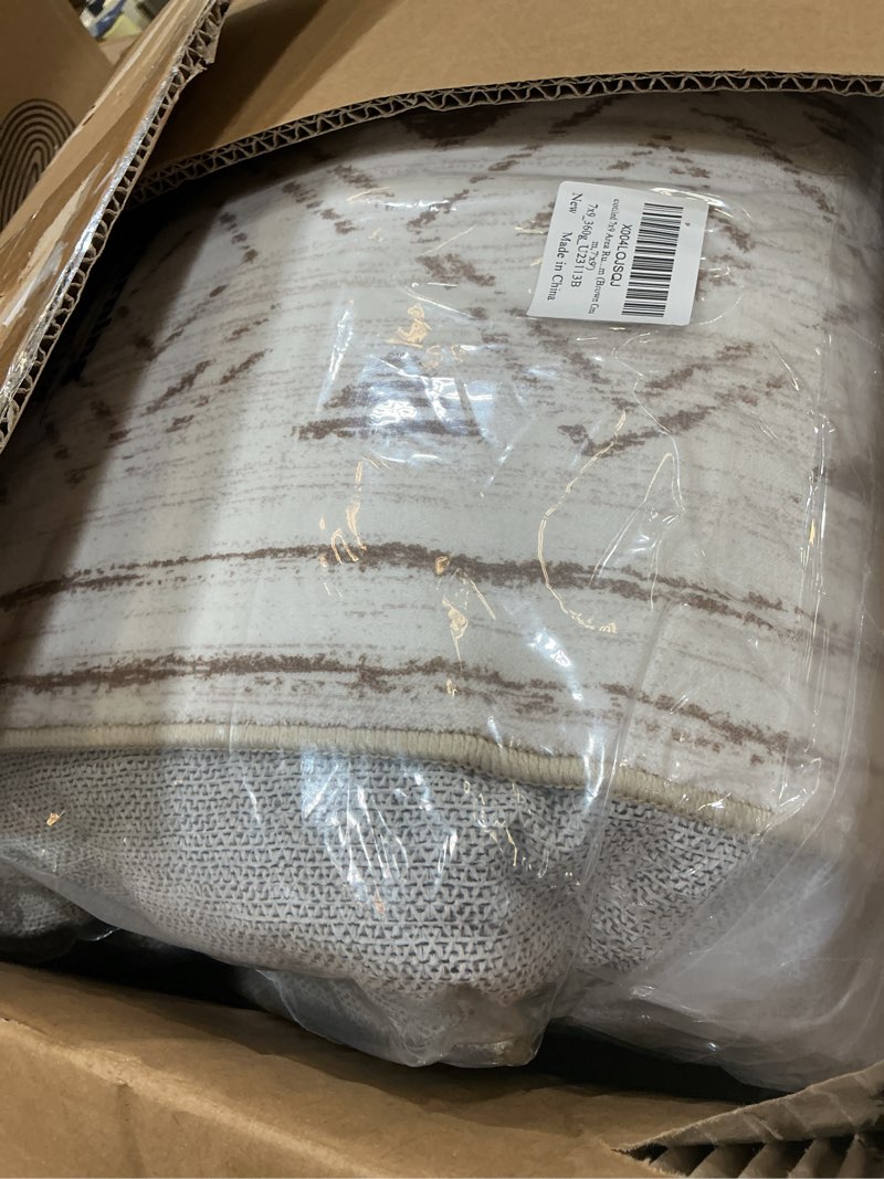 Condition photo showing New/Like New for cotiled 7x9 area rug living room: washable boho rugs with non slip backing large soft indoor stain resistant carpet for bedroom farmhouse dining room lightweight home decor l brown/cream light brown/cream 7' x 9' (rectangular)