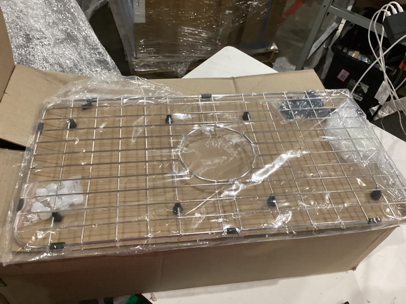 Condition photo showing Good Condition for sink protector grid, sink grids for bottom of kitchen sink with corner radius 3/16",27-9/16" x 14-9/16" sink protector, stainless steel material (27.7"w x 14.7"d x 1"h) 27-9/16" x 14-9/16 (rear drain)