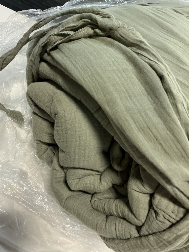 Condition photo showing As Is for organic cotton gauze dream quilt, king/cal king, dried sage