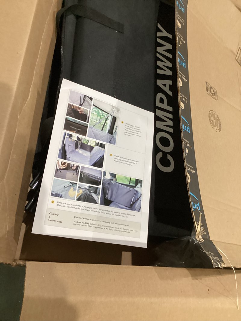    This product is a quilted, waterproof car backseat extender and seat cover designed to protect vehicle interiors from pets.  