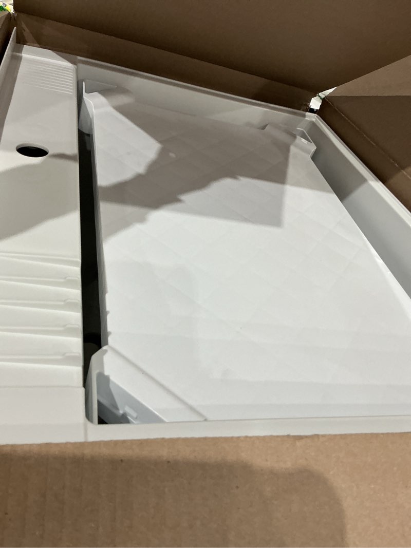 Condition photo showing As Is for project source 30-in x 24-in 1-basin white freestanding utility tub with cabinet, drain, and faucet