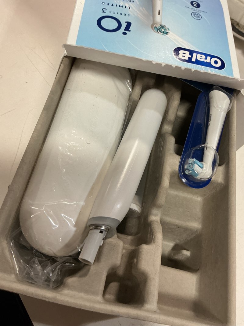 Condition photo showing As Is for Oral-B iO Deep Clean Rechargeable Electric Powered Toothbrush, White with iO Series 3 Limited, 2 Brush Heads and Travel Case - Pressure Sensor to Protect Gums - 3 Cleaning Settings - 2 Minute Timer 1 Count (Pack of 1) White
