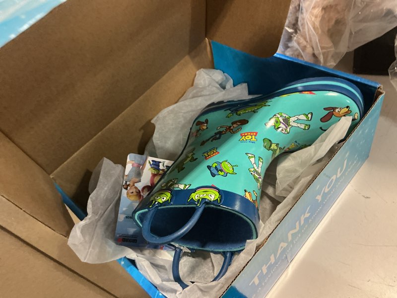 Condition photo showing Good Condition for pixar rainboots for kids 6 toddler green