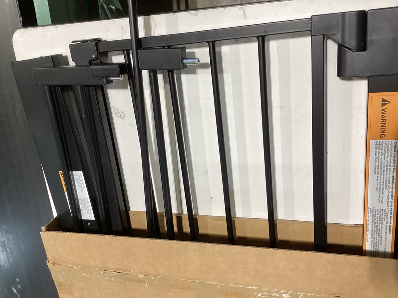 Condition photo showing As Is for babelio smart baby gate with auto-unlock/close, pressure mounted no drill for doorways/top of stairs. pet/dog door wide walk thru w/infrared sensor & instant safety alert (black, 26.3-37.8" w, 30" h) black 26.3-37.8" w, 30" h