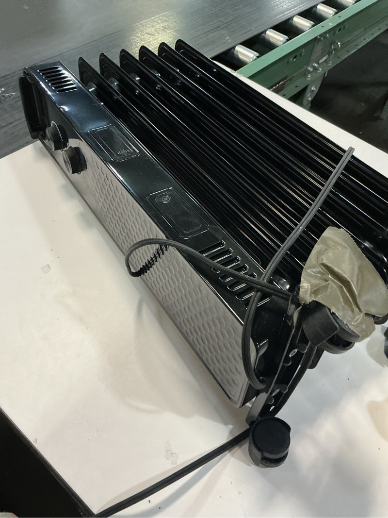 Condition photo showing As Is for Portable Electric Radiator Heater, Space Oil Filled Heaters with 3 Heat Settings, Adjustable Thermostat, Overheat & Tip-Over Protection For Indoor Use,1500W (Black)