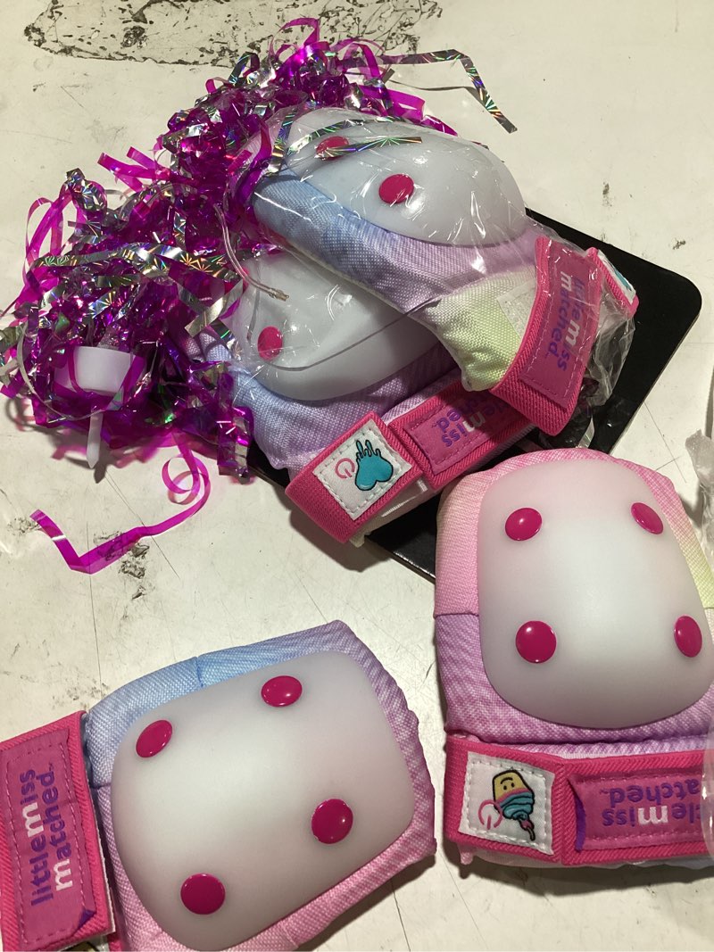 Condition photo showing Good Condition for littlemissmatched light-up children’s elbow/knee pads and streamers