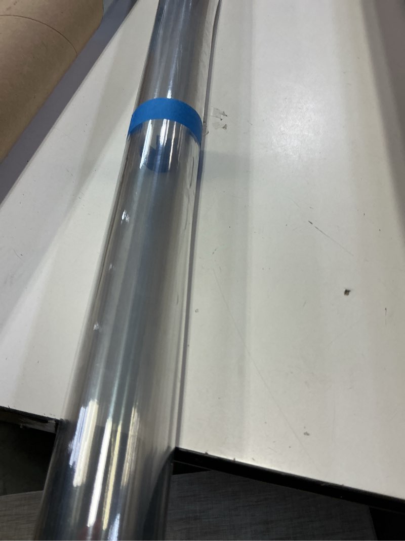 Condition photo showing As Is for 24 x 48 Inch Clear Table Cover Protector, 2mm Thick Clear Table Protector for Dining Room Table, Plastic Table Cover, Waterproof Table Pad for Kitchen, Office Clear 2mm 24" x 48"