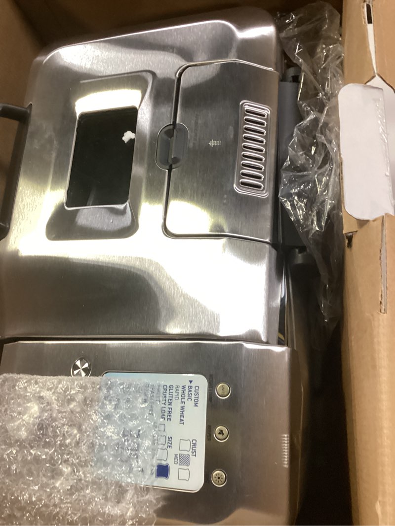 Condition photo showing As Is for breville bbm800xl custom loaf bread maker machine, brushed stainless steel