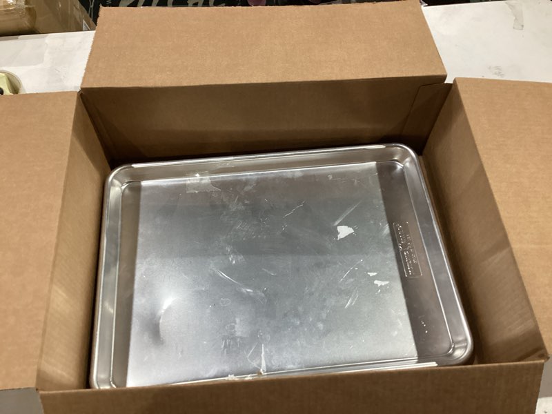 Condition photo showing As Is for Nordic Ware Naturals Half Sheet - USA Made Aluminum Commercial Quality Sheet Pan for Baking or Roasting, Encapsulated Galvanized Steel Rim Prevents Warping, 2-Pack 2pk Half Sheet
