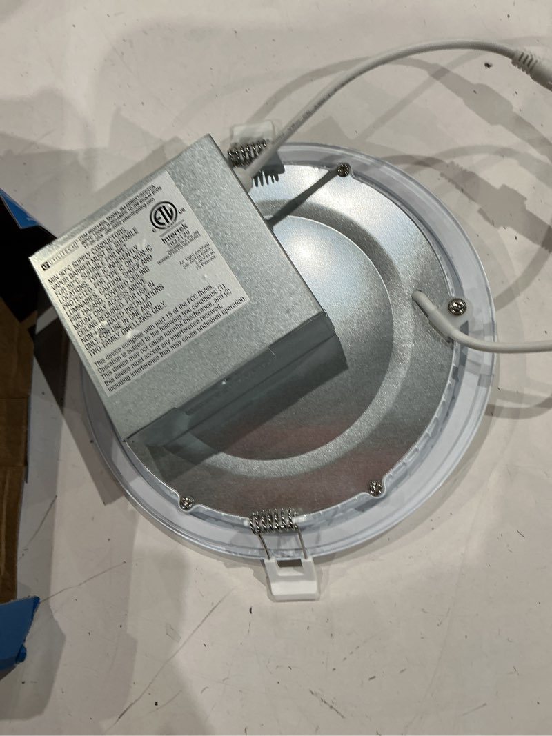 Condition photo showing As Is for utilitech white 6-in 850 -lumens switchable white round dimmable led canless wet rated recessed downlight