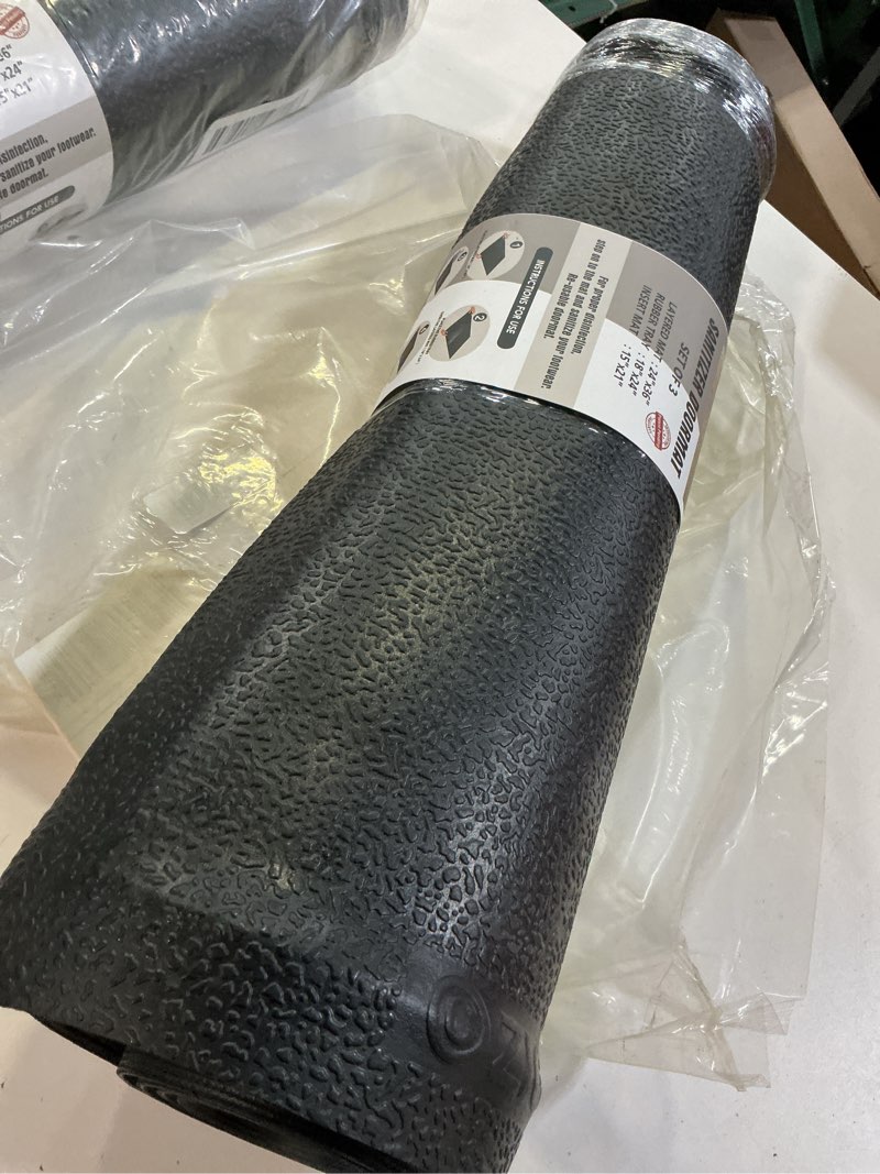 Condition photo showing New/Like New for rugsmith layered rubber sanitizer doormat, 3 pieces, 24"x36", 18"x24", 15"x21"