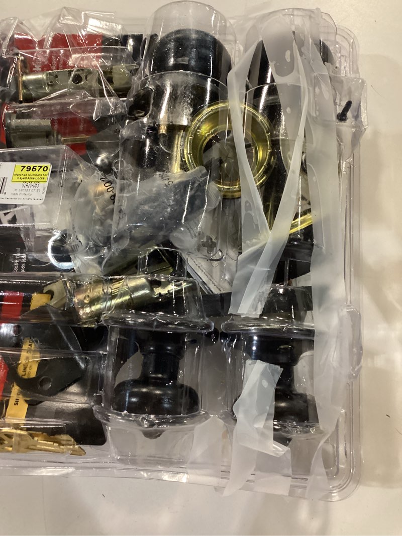 Condition photo showing As Is for cove venetian bronze keyed entry door knob and single cylinder deadbolt project pack featuring smartkey and microban