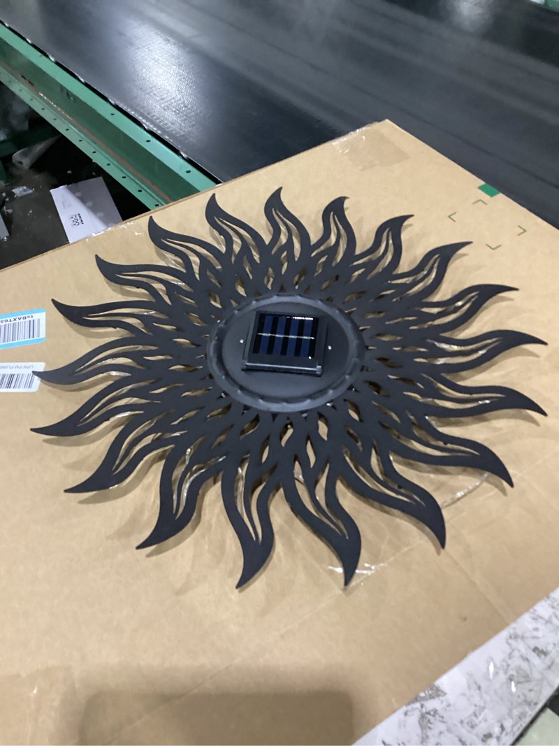 Condition photo showing As Is for VCUTEKA 20" Sun Metal Wall Art Outdoor Decor Solar Decoration Metal Wall Sculpture Hanging Garden for Indoor Outdoor Patio Fence Decoration Black