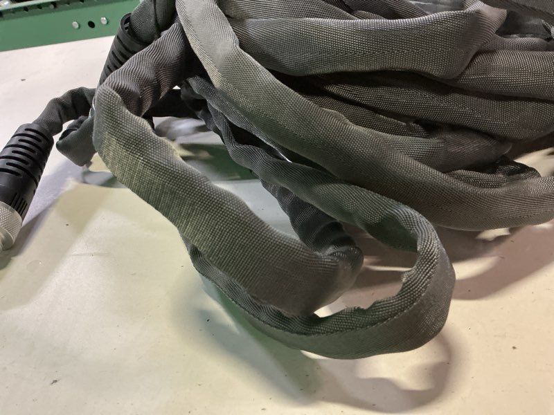 Condition photo showing As Is for zero-g teknor apex 5/8-in x 50-ft premium -duty kink free woven gray hose