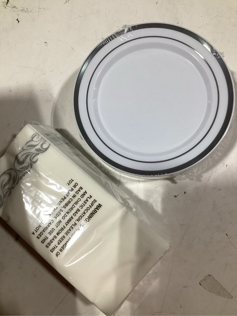 Condition photo showing As Is for 25 pc cutlery set, disposable, 2 size plates, cups, silverware