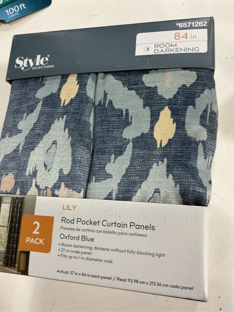 Condition photo showing New/Like New for style selections 84-in oxford blue floral room darkening rod pocket curtain panel pair