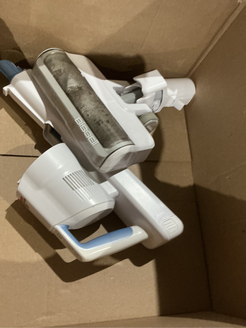 Condition photo showing As Is for bissell powerclean 200w self-standing cordless vacuum w/tangle free brush roll, removeable battery, wall mount, upholstery tool & bright headlights, 4173