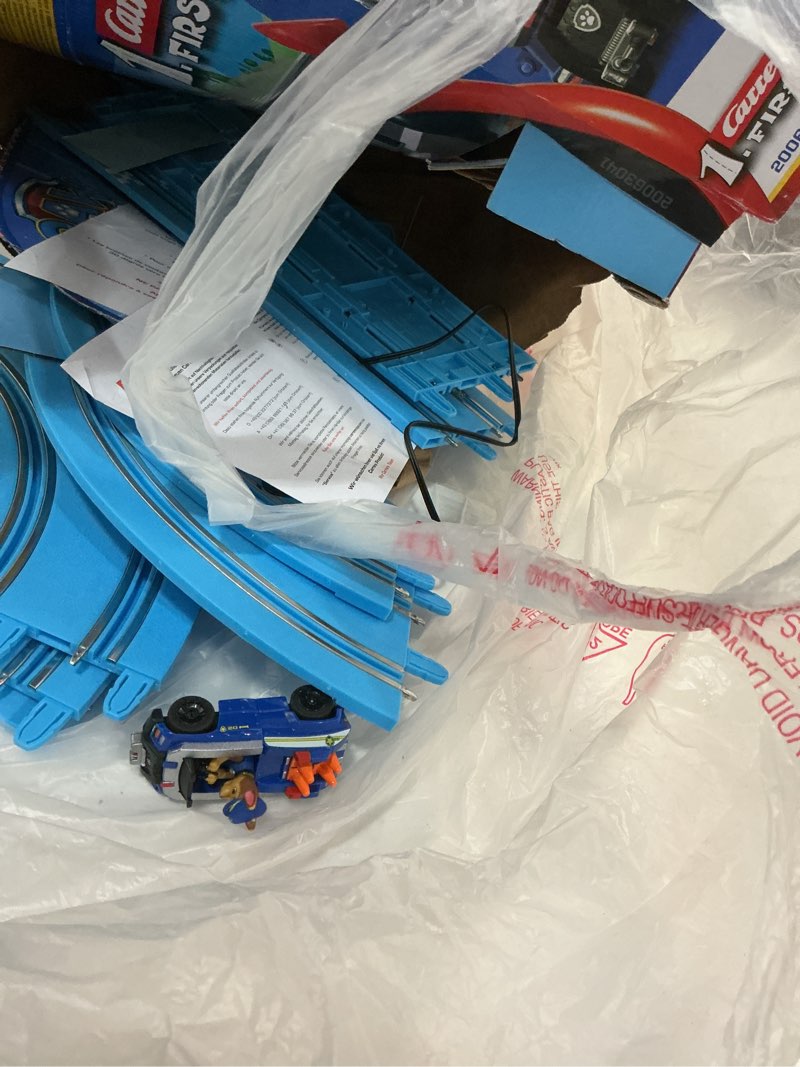 Condition photo showing As Is for carrera first paw patrol - slot car race track - includes 2 cars: chase and skye - battery-powered beginner racing set for kids ages 3 years and up, multi