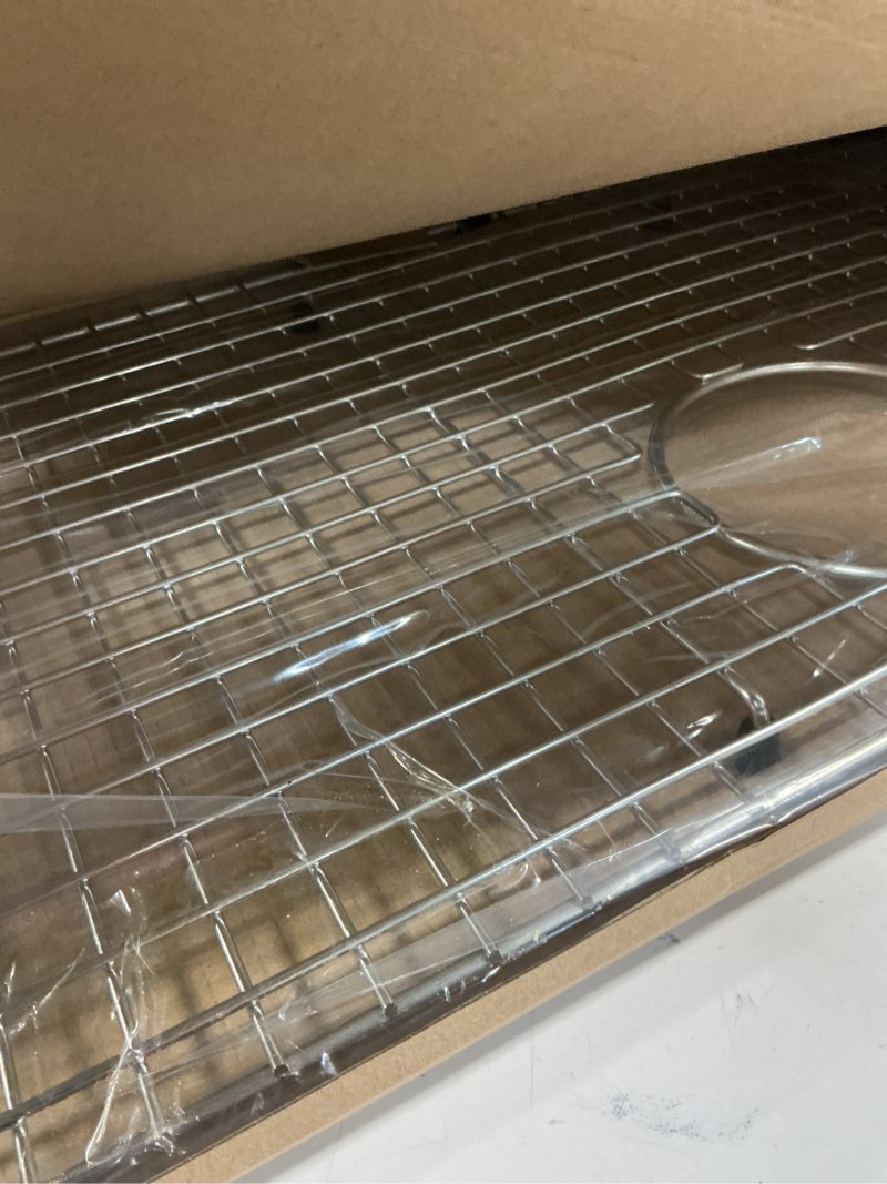 Condition photo showing Good Condition for serene valley sink bottom grid 29-1/2" x 14-9/16", rear drain with corner radius 3/8", sink protector ndg3015r