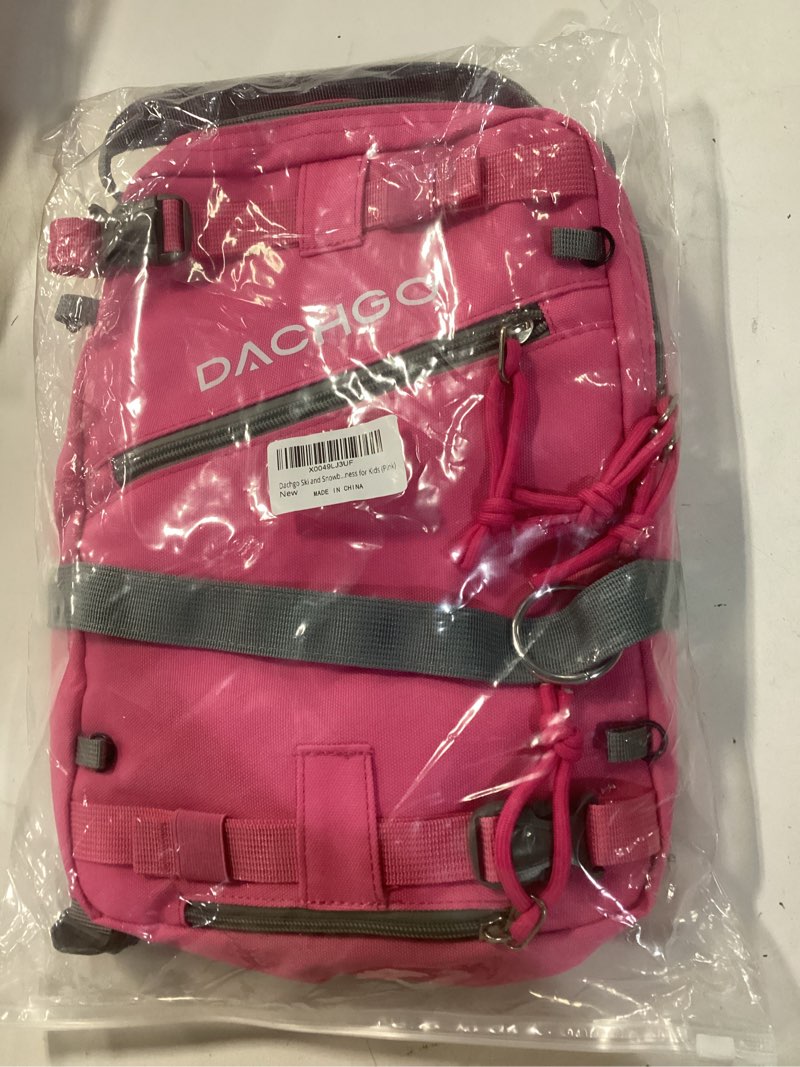 Condition photo showing New/Like New for Ski and Snowboard Harness with Training Leash for Kids - Teach Your Child The Fundamentals of Skiing or Snowboarding Pink Backpack with Traning Leash