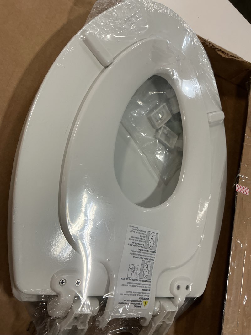 Condition photo showing Good Condition for Mayfair NextStep2 Toilet Seat with Built-In Potty Training Seat, Slow-Close, Removable that will Never Loosen, Elongated, White Elongated (1-Pack) 1-Pack