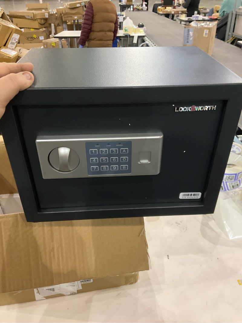 Condition photo showing As Is for Safe for Home, 0.6 Cubic Feet Safety Box, Lock Box for Money, Jewelry, Documents and Guns, Digital Security Safe for Office, Hotel and Personal Use, 13.8"W x 9.8"D x 9.8"H