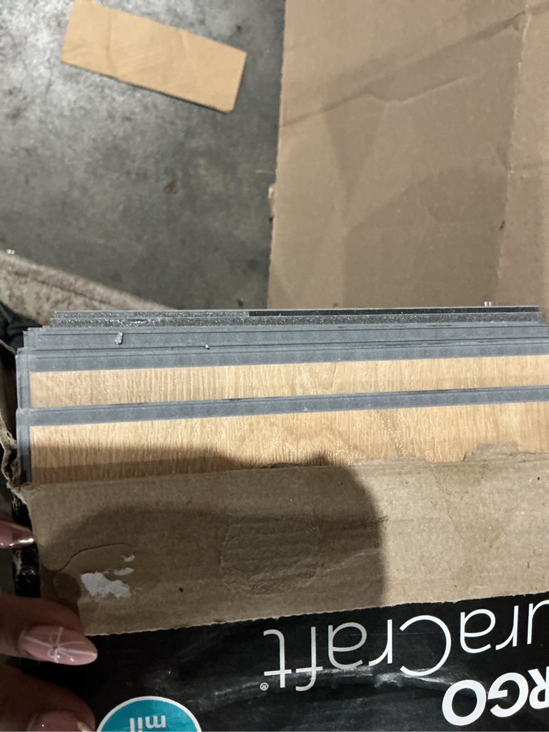 Condition photo showing As Is for pergo duracraft bruges oak brown 22-mil x 7-1/2-in w x 47-in l waterproof interlocking luxury vinyl plank flooring (17.32-sq ft/ carton)