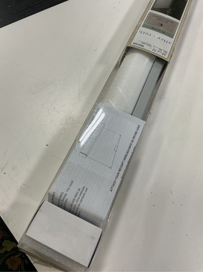 Condition photo showing Good Condition for allen + roth 34-in x 72-in white room darkening cordless roller shade