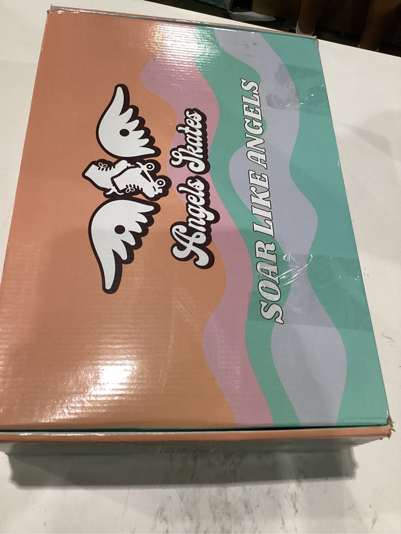 Condition photo showing Good Condition for angel skates , white with pink wheels, womens size 12