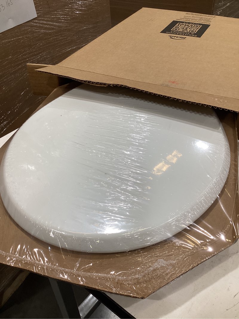 Condition photo showing New/Like New for mayfair bennett toilet seat with brushed gold hinges, slow close wood seat, secure metal hinges, easy install, made in usa, round, white round gold