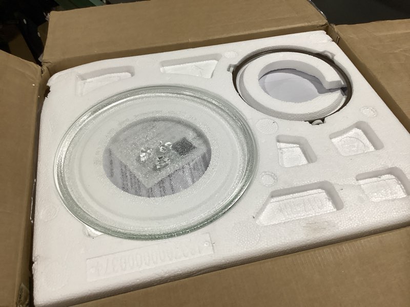 Condition photo showing Good Condition for ge countertop microwave oven, compact 0.7 cubic ft., 700-watt capacity, 6 auto cooking settings, child-lock technology, kitchen essentials for the countertop, dorm room or apartment, white 0.7 cu.ft. white