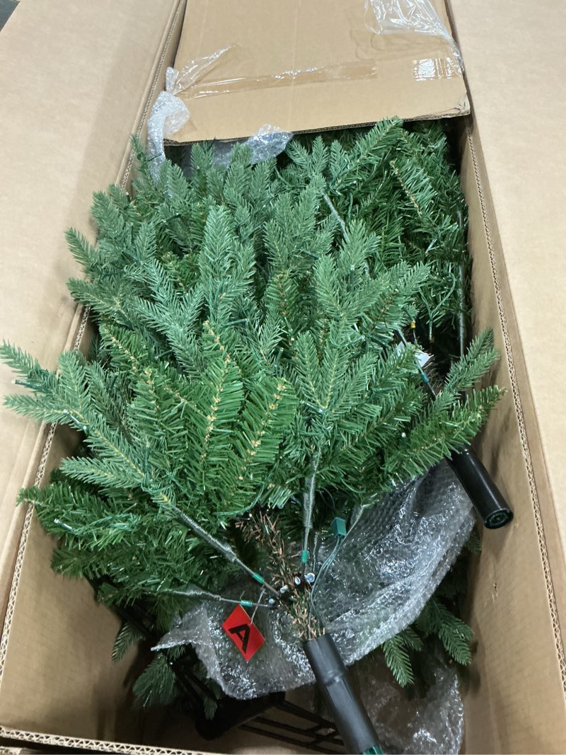 Condition photo showing item condition for National Tree Company 7.5 ft Pre-Lit Dunhill Fir Artificial Christmas Tree, 700 LED Lights, 2,514 Tips, Foot Pedal, 10 Light Functions, Includes Stand, Green