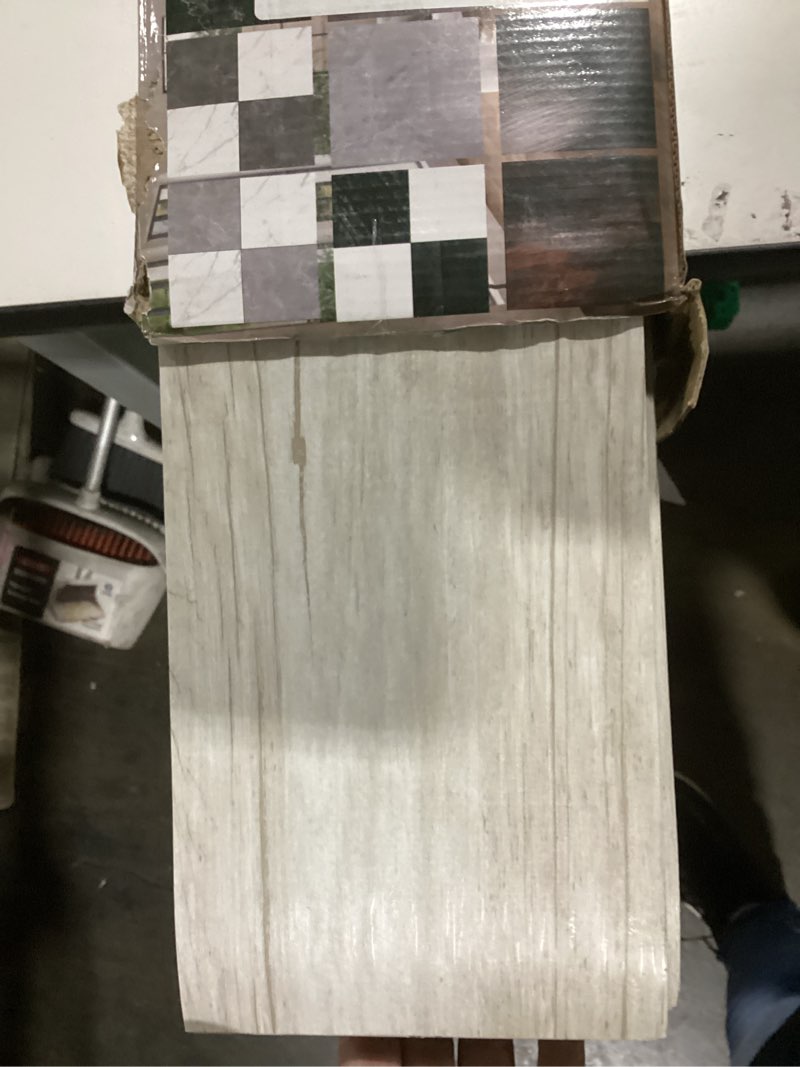 Condition photo showing As Is for 54 Sq.Ft. Peel and Stick Vinyl Floor Tiles 36" x 6" Wood Look Planks, 36 Pack Waterproof Self-Adhesive Flooring Tiles, DIY for Renter, Kitchen, Living Room, RV, Washed White