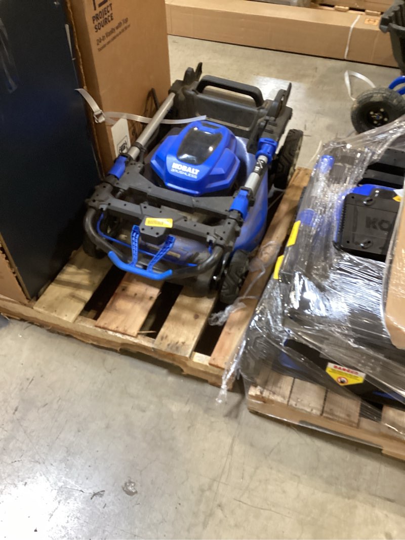 Condition photo showing As Is for kobalt 48v max (24vx2) 21-in self-propelled mower kit, (2) 6.0ah batteries and charger included
