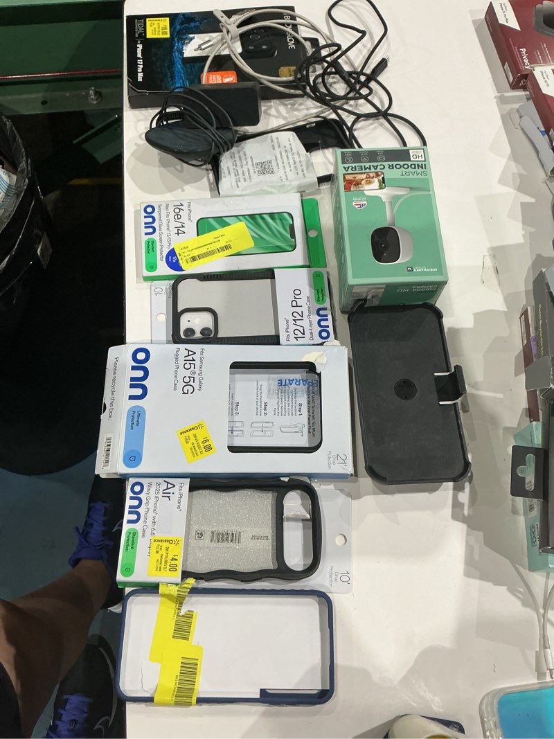 Condition photo showing As Is for assorted cellphone/tablet/laptop case covers & accessories