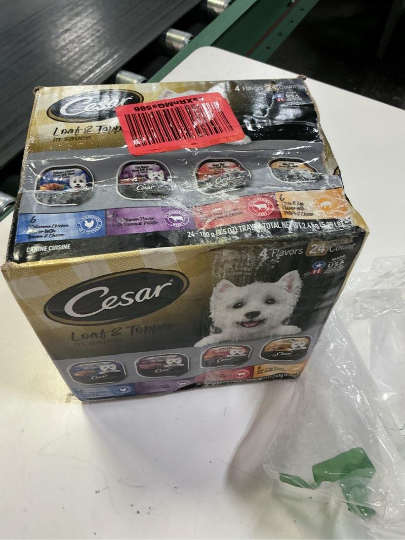 Condition photo showing Good Condition for (best by  / 12 / 2027 ) cesar loaf in sauce wet dog food rotisserie chicken, filet mignon, angus beef, and ham & egg flavors variety pack, wet food for dogs, 3.5 oz easy peel trays, 24 count chicken, filet mignon, beef, ham & egg 24 count (pack of 1)