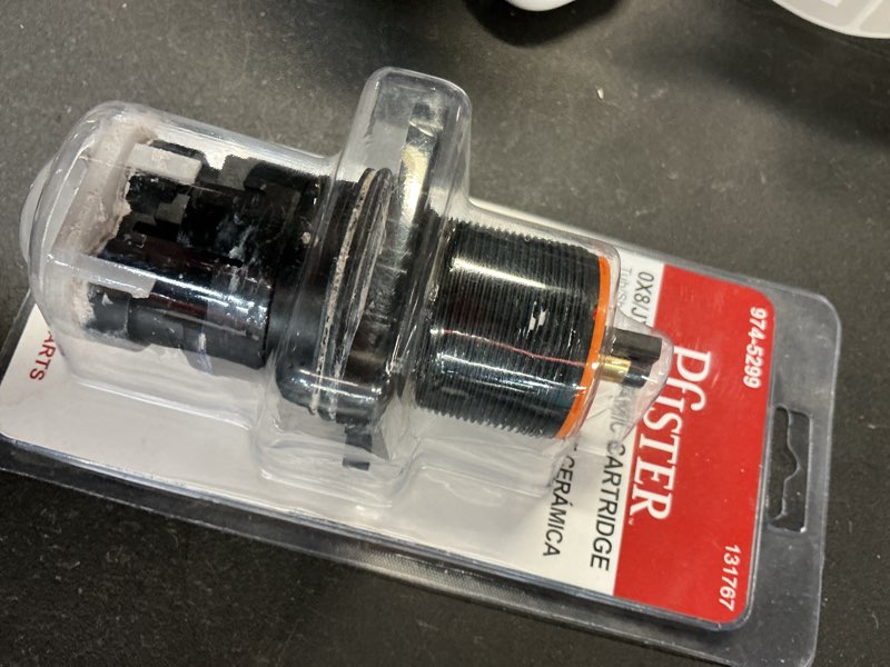 Condition photo showing As Is for pfister 974-5299 genuine factory part tub shower cartridge open box
