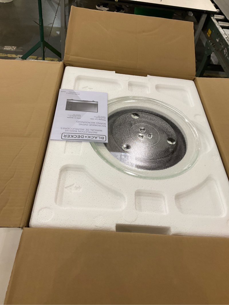 Condition photo showing As Is for BLACK+DECKER EM031MB11 Digital Microwave Oven with Turntable Push-Button Door, Child Safety Lock, 1000W, 1.1cu.ft, Black & Stainless Steel, 1.1 Cu.ft