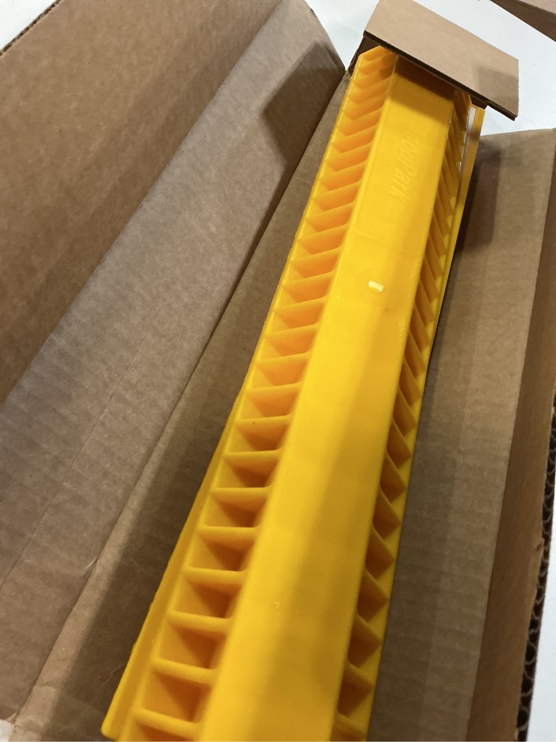 Condition photo showing Good Condition for camco accupark vehicle parking aid | features heavy duty high visible resin design | easy peel & stick installation | measures 18-1/16" x 3-5/8" x 1-3/8" | 2-pack (44441)