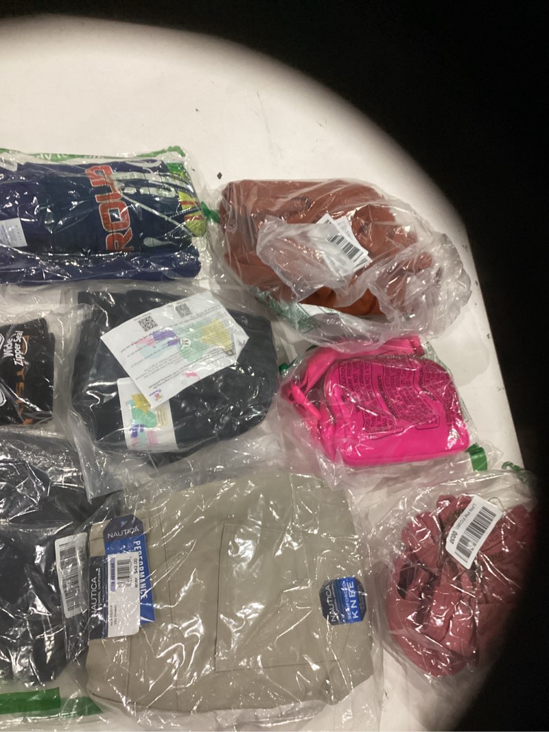 Condition photo showing Good Condition for assorted lot of apparel (men’s, women’s, kids, clothes of all different sizes)